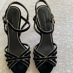 Black heels with gold edging. Great condition. No box from smoke free home.